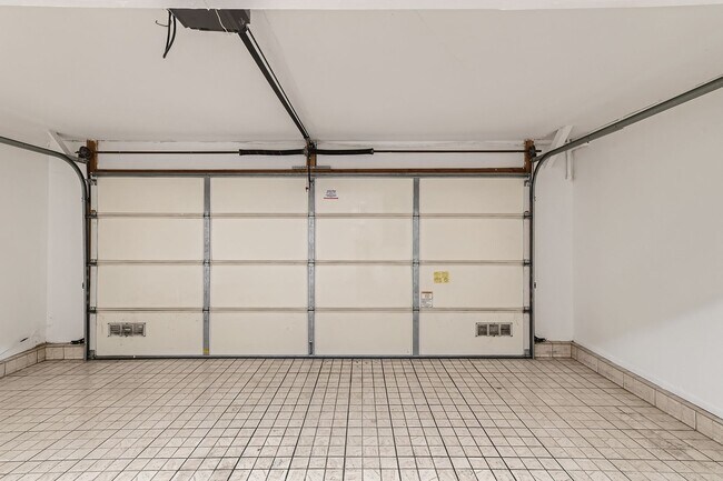 Building Photo - Freshly Updated 2-Bedroom Condo with Attached Garage in Gated Winnetka Community