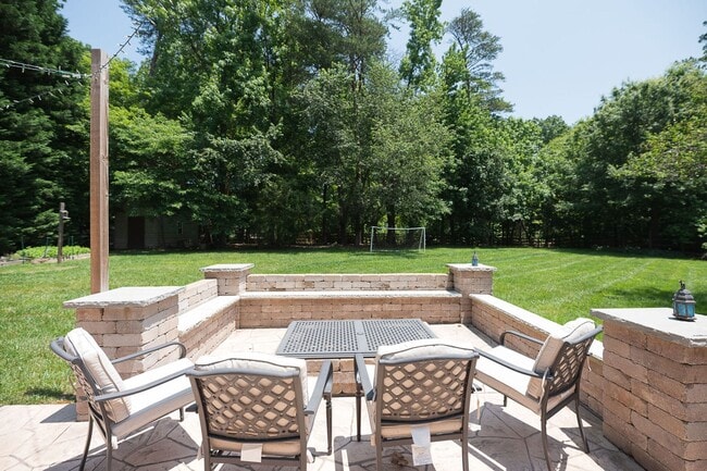 Building Photo - Spacious & Striking 3-story brick Executive 4 bedroom 4.5 bathroom home in Oak Ridge NC + Lawn ca...