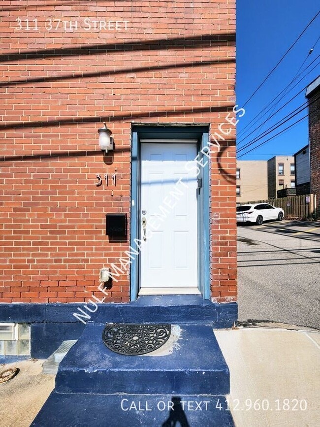 Building Photo - 311 37th St