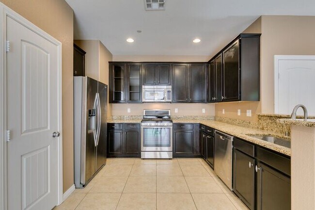 Building Photo - Better Than New with Stunning Designer Upgrades Throughout!