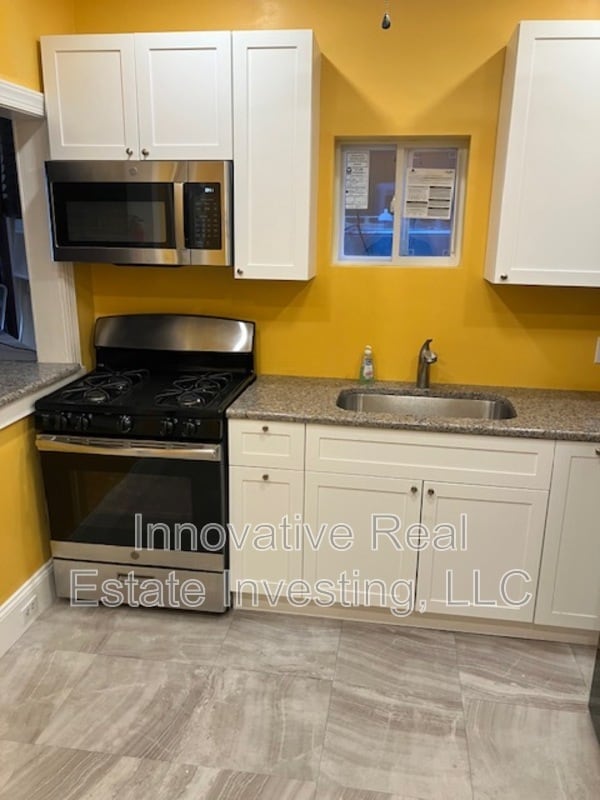 Building Photo - 6115 Lansdowne Ave