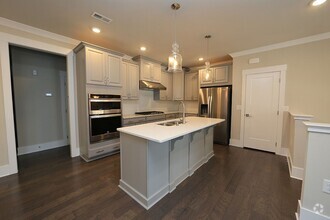 Building Photo - Modern Condo in Brier Creek Cottages Commu...