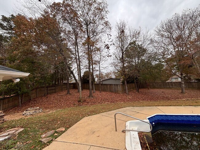 Building Photo - Executive Rental with Pool and Fenced yard