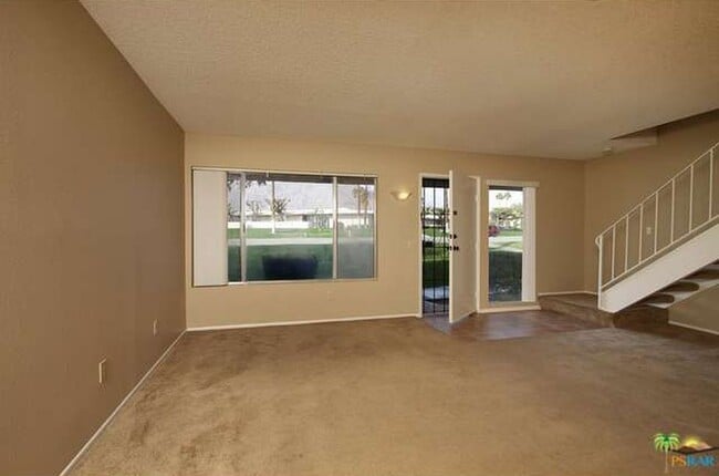 Building Photo - Spacious 4-Bedroom Condo in Indian Canyon ...