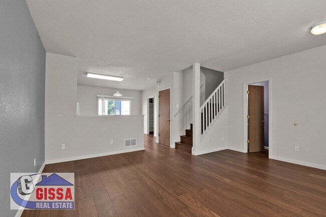 Building Photo - Cute home with engineered hardwood flooring throughout is available now!