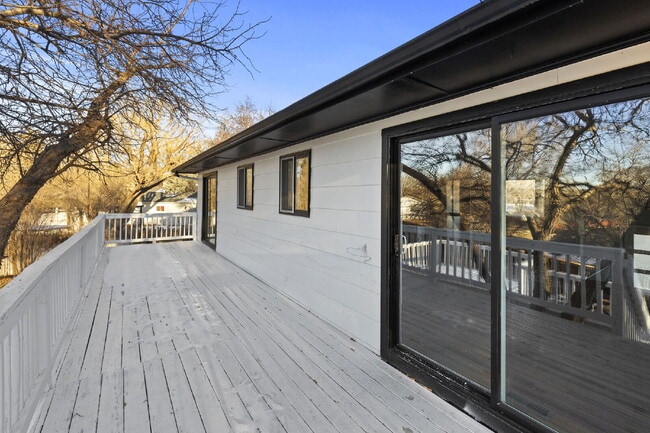 Building Photo - Spacious Split-Level Home with Beautiful Kitchen, Large Deck, and Fully Fenced Yard