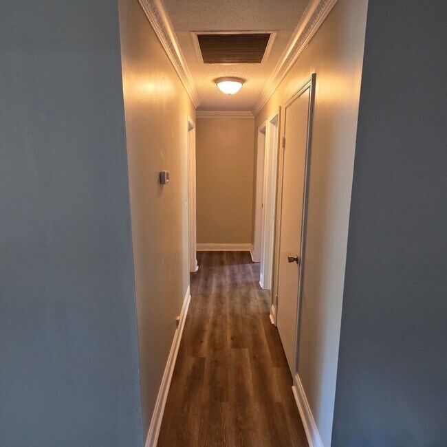 Building Photo - Corner Lot Charm: Spacious 4 Bed on Corner Lot w/ Custom Bookshelves & Private Storage Shed