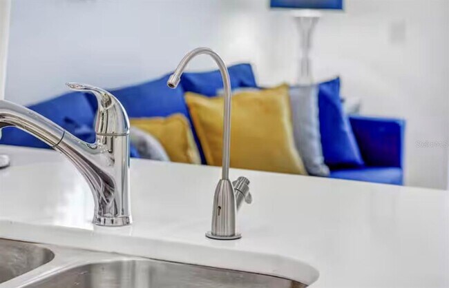 Building Photo - 8117 Princess Palm Ln