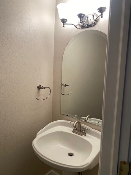 Half bath on main floor - 411 E Highline Cir