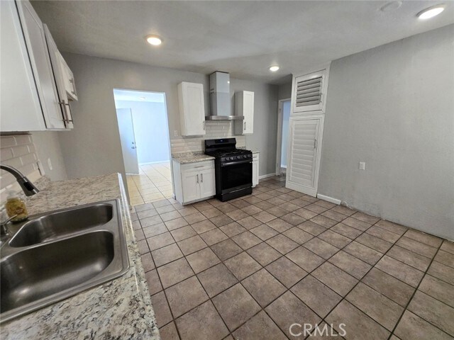 Building Photo - 16466 Arrow Blvd