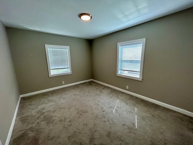 Building Photo - DELHI TWP- Spacious 4 bedroom 3 bath Cape Cod with garage