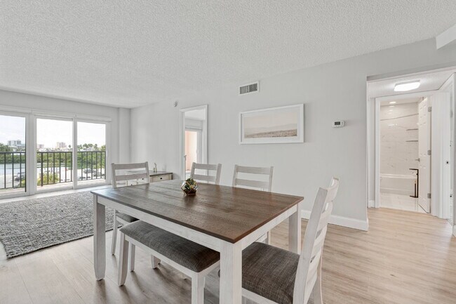 Building Photo - NEWLY RENOVATED TWO BEDROOM CONDO IN WATERFRONT RESORT STYLE COMMUNITY