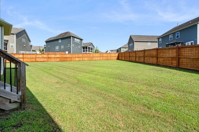 Building Photo - Luxurious 4-Bedroom Retreat with Third Floor Bonus Room & Fenced-in Backyard