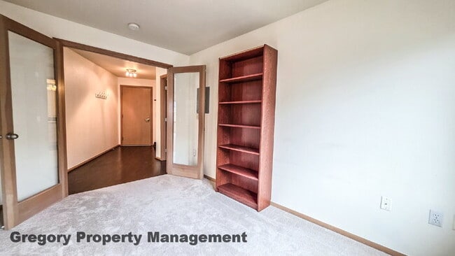 Building Photo - Sunny Capitol Hill 2 BR 1.5 BA Condo with Garage Parking Included & Skyline Views!