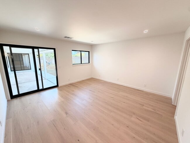 Building Photo - This premier 4-bed, 3-bath estate spans 2,565 sq. ft. on a 10,253 sq. ft. lot in North Los Altos.