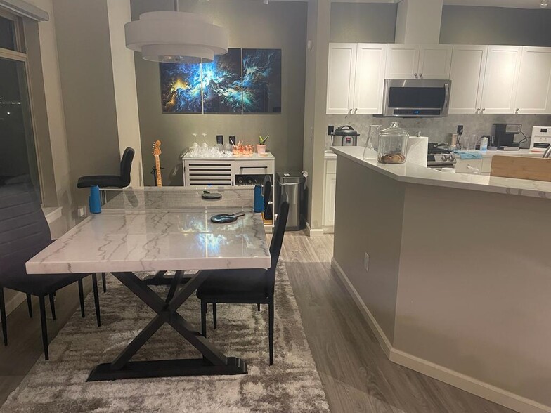 Dining Table besides Kitchen - 900 Aurora Ave N