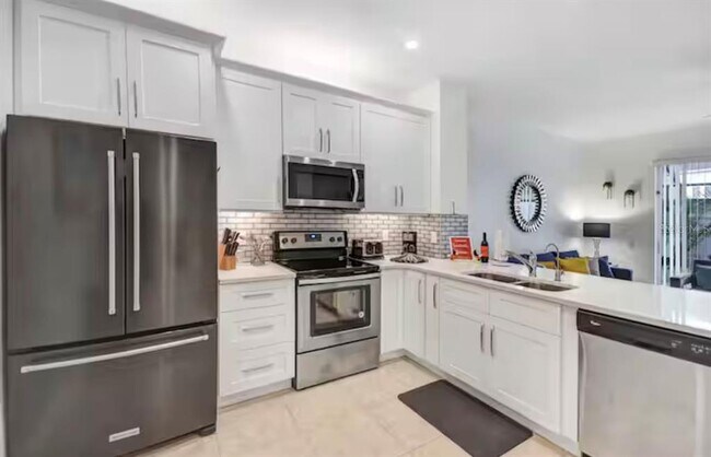 Building Photo - 8117 Princess Palm Ln