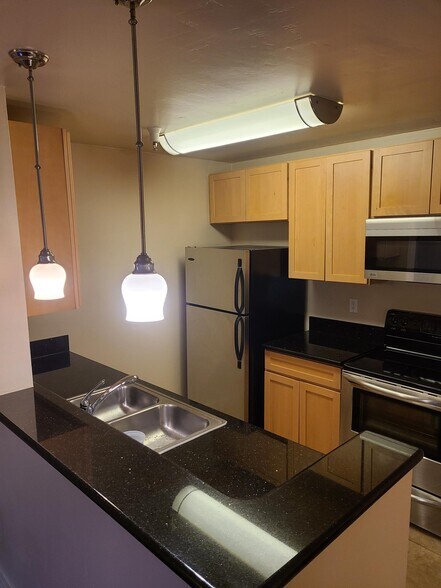 Building Photo - 6400 Christie Ave