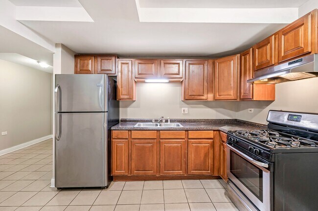 Building Photo - 4851 S Prairie Ave | Jim Sears