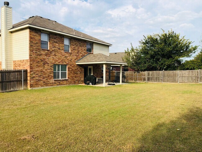 Building Photo - Coming Soon Spacious 4-Bedroom Home for Re...