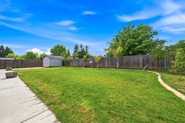 Building Photo - 3 Bedroom Home with RV/Boat Parking, Large Yard & Chicken Coop – Cul-de-Sac Location Near Kids Ki...