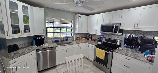 Building Photo - Welcome to **Caloosa Yacht & Racquet Club**, one of Fort Myers’ most charming **gated waterfront ...