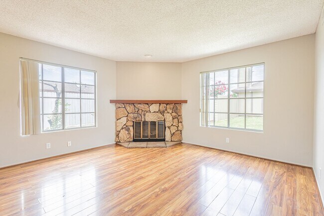 Building Photo - Spacious Single-Story 3-Bedroom Condo with Private Patio and 2-Car Garage