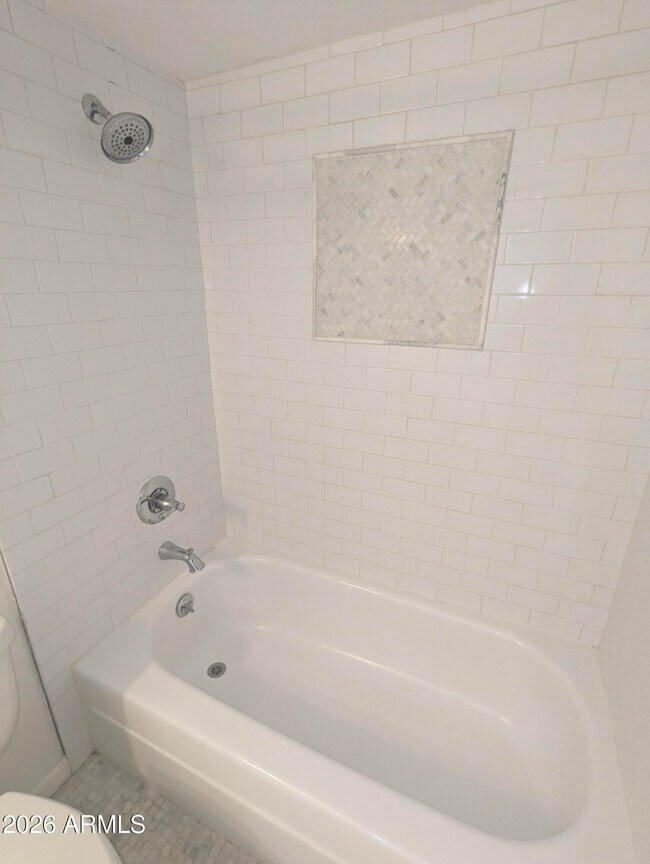 Building Photo - 7910 E Camelback Rd