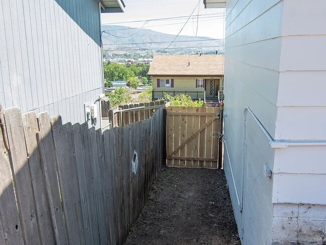 Building Photo - "Charming 5-Bed Sanctuary with Cozy Fireplace on South Rogers Street!"