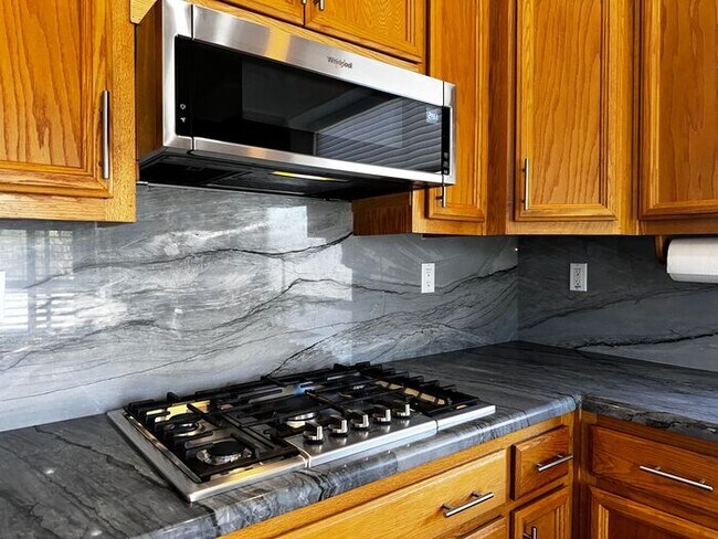 Building Photo - Spacious 3BR, 2BA with Solar and Modern Up...