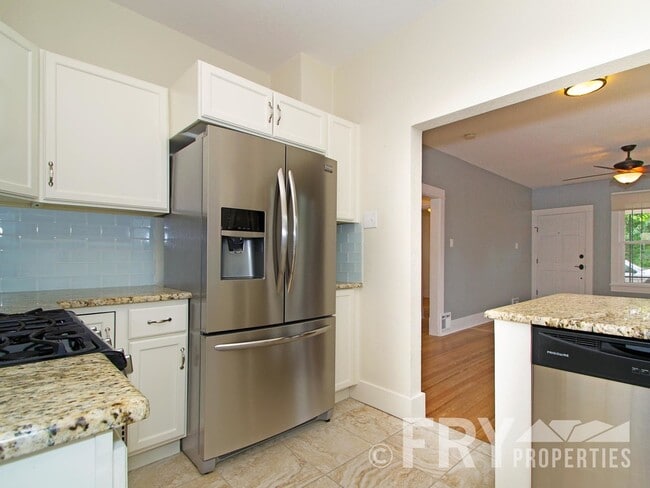 Building Photo - Classic bungalow with modern finishes in burgeoning Regis neighborhood.