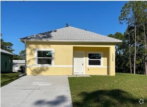 Building Photo - Available Now Three Bedroom 2 bath/ Single...