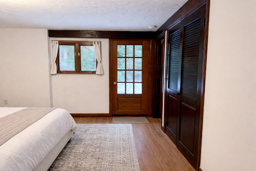 Primary bedroom walk out onto private deck - 111 North Rd