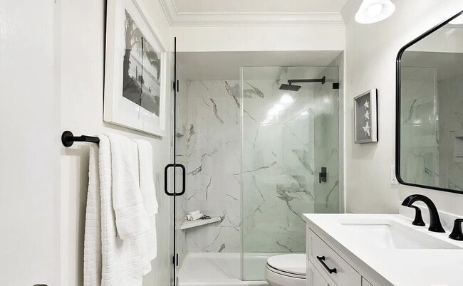 Building Photo - This 1-bedroom, 1-bathroom gem offers the perfect blend of contemporary style, convenience, and t...