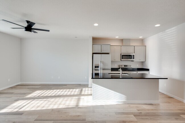 Building Photo - Baraya Townhomes: Modern Townhomes for Ren...