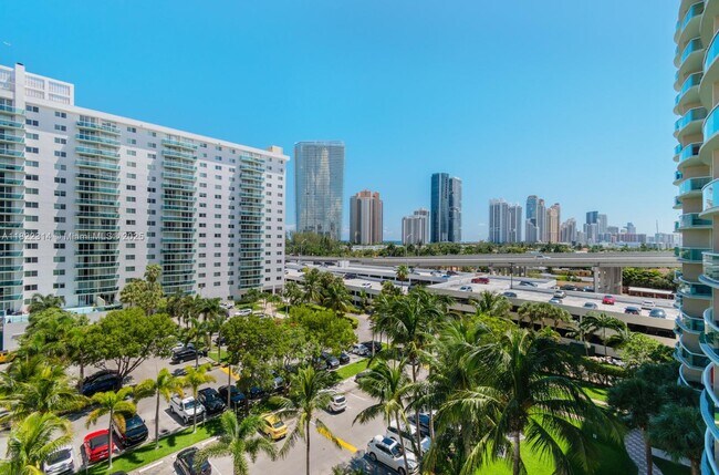 Building Photo - 19390 Collins Ave
