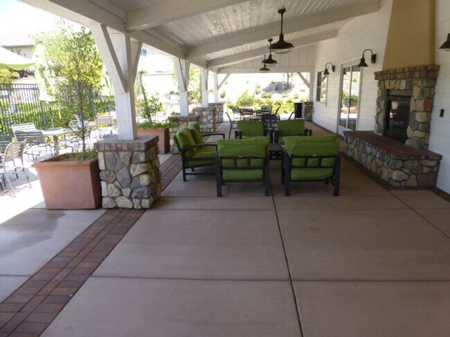 Building Photo - Short Term Lease - Grand 4-Bedroom Home with Entertainer's Yard in Gated River Village!