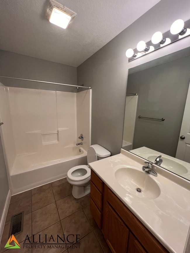 Building Photo - NEWLY PAINTED! Walk Out Basement & Much, Much More!