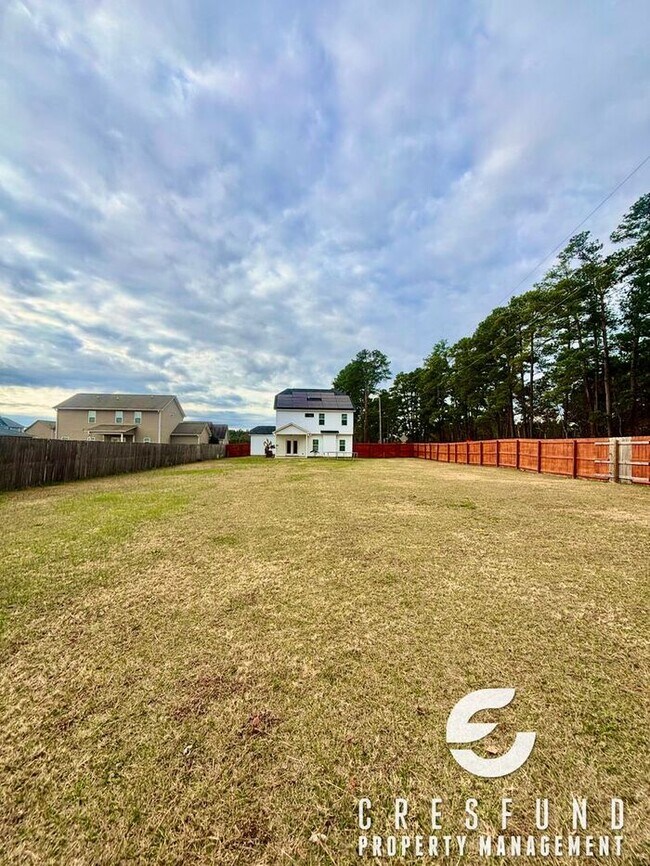 Building Photo - 4 Bedroom Close to FT. Bragg will have you saving big with Solar Panels