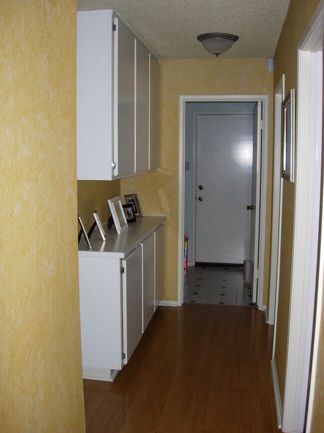 Hall to garage - 10750 Spyglass Dr