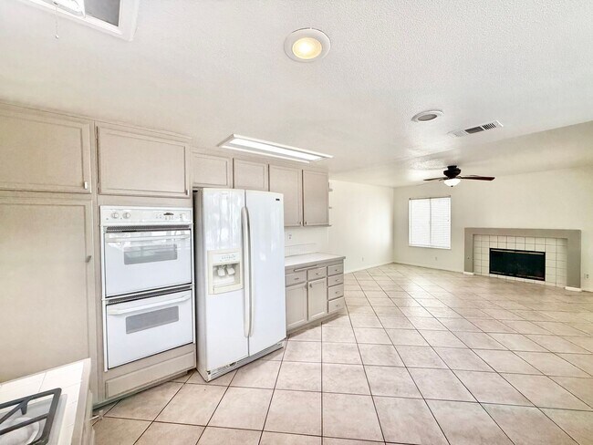 Building Photo - Spacious 5 Bedroom 3 Bathroom Home with Updated Paint, New Roof & Private Balcony