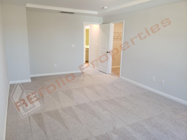 Building Photo - Brand New 3 BR 1-Car Garage Townhome in Do...