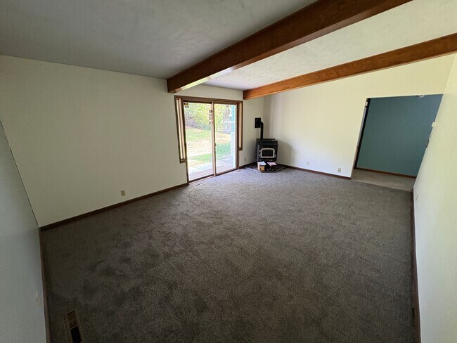 Building Photo - Spacious Home with Attached Garage & Fenced Backyard