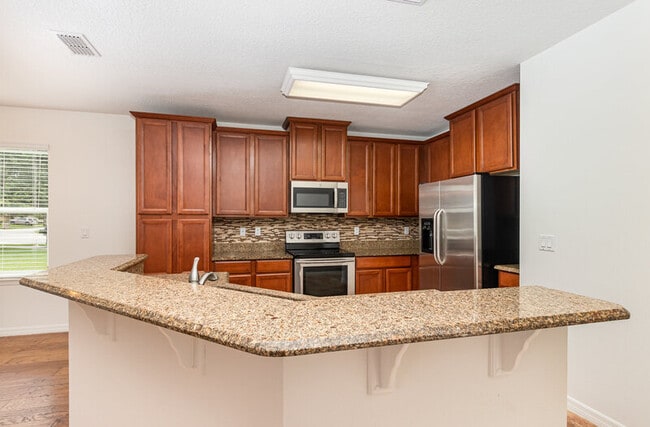 Building Photo - 9026 Paolos Pl