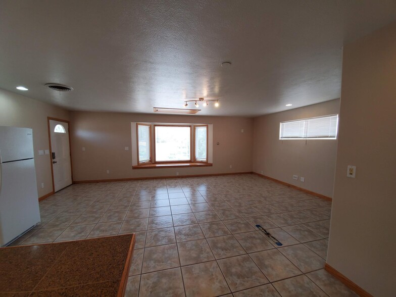 View of living area from bedroom door - 230 Yale Pl