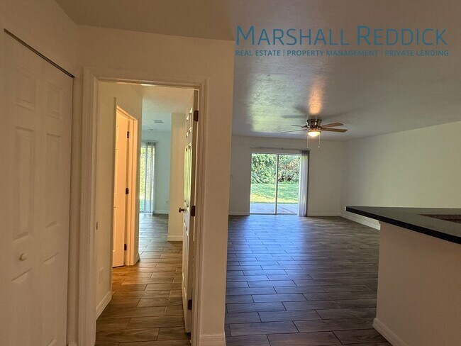 Building Photo - Beautiful wood tile floors! 3 Bed 2 Bath 1...