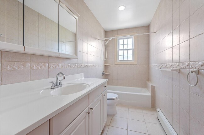 Building Photo - 38-42-42 216th St