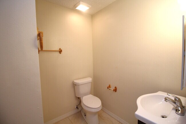 Building Photo - West Pensacola Duplex Living — 3BR Home with Open Floor Plan, Eat-In Kitchen, Covered Patio & Low...