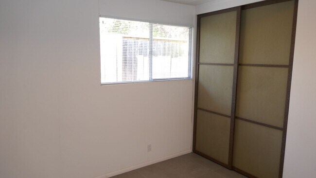 Building Photo - BEAUTIFUL UPDATED FOUR BED / TWO BATH PLUS OFFICE EICHLER HOME WITH GREAT OUTDOOR SPACE