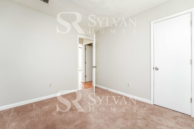 Building Photo - Lease today! No extra charge for contentme...